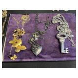 Assorted Lariat Necklaces - Gold tone & Silver-Tone Fashion Jewelry in Display Case
