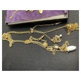 Assorted Lariat Necklaces - Gold tone & Silver-Tone Fashion Jewelry in Display Case