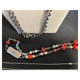 Assorted Trendy Necklaces & Pendants - Agate Slices, Enamel Tiles, Beads in a Display Case