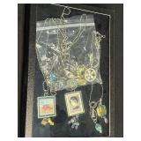 Vintage Stamp Pendant Necklaces & Rhinestone Brooches in Display Case - brooches missing stones or pins