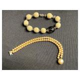 Double-Strand Pearl Bead Bracelet (unauthenticated) & Cream Textured Bead Stretch Bracelet with Black Faceted Accent
