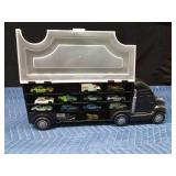 Semi toy car carrier with Hot Wheels and Matchbox cars