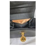 Black Structured Top Handle Handbag With Gold Clasp