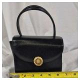 Black Structured Top Handle Handbag With Gold Clasp