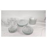 Clear Glass Dinnerware Including Plates, Bowls, and Cups