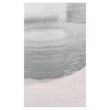 Clear Glass Dinnerware Including Plates, Bowls, and Cups