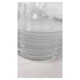 Clear Glass Dinnerware Including Plates, Bowls, and Cups