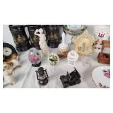 Assorted Vintage Collectible Items including Uncle Sam Mug, Decorative Plates, and Figurines
