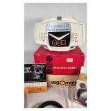 Vintage Veg-O-Matic Food Preparer and Kitchen Items Lot including Thermos, Egg/Pancake Ring Set, and Clips