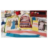 Sewing Supplies including Wooden Sewing Box, Needle Sets, Patterns, and Accessories