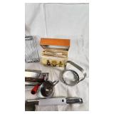 Vintage Kitchen Utensil Collection including Potato Ricer, Rolling Pin, and Hand Mixer