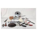 Lot of Vintage Kitchen Tools and Gadgets including Bun Size Wooden Hamburger Press, Potato Masher, and Egg Beater