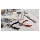 Lot of Vintage Kitchen Tools and Gadgets including Bun Size Wooden Hamburger Press, Potato Masher, and Egg Beater