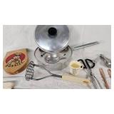 Lot of Vintage Kitchen Tools and Gadgets including Bun Size Wooden Hamburger Press, Potato Masher, and Egg Beater