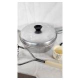 Lot of Vintage Kitchen Tools and Gadgets including Bun Size Wooden Hamburger Press, Potato Masher, and Egg Beater