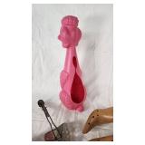 Plastic Pink Poodle, Wooden Shoe Stretchers, and Metal Shoe Stretchers