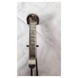 Plastic Pink Poodle, Wooden Shoe Stretchers, and Metal Shoe Stretchers