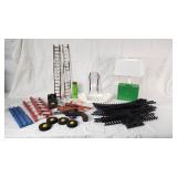 Vintage Toy and Model Train Accessories including Track, Ladders, and Vehicles
