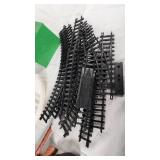 Vintage Toy and Model Train Accessories including Track, Ladders, and Vehicles