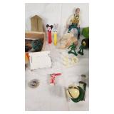 Assorted Toys and Collectibles Including John Deere Tractor, Action Figures, and Accessories