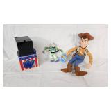Eternal Revenue Man Coin Bank, Buzz Lightyear Mini Buddy, and Woody Doll