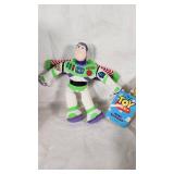 Eternal Revenue Man Coin Bank, Buzz Lightyear Mini Buddy, and Woody Doll