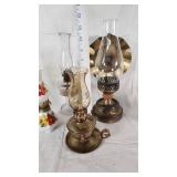 Collection of Vintage Oil Lamps with Colorful Glass and Metal Features