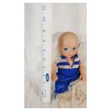 Vintage Doll in Blue Dress with Lace Accents