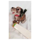 Plush Dog Toy (back legs broken), Yellow Stapler, Easter Egg, and Miscellaneous Items