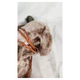 Plush Dog Toy (back legs broken), Yellow Stapler, Easter Egg, and Miscellaneous Items