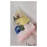 Plush Dog Toy (back legs broken), Yellow Stapler, Easter Egg, and Miscellaneous Items