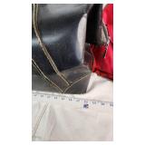 Tan Duffel Bag, Black Leather Bag, and Red Travel Bag