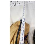 Tan Duffel Bag, Black Leather Bag, and Red Travel Bag