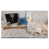 Vintage Household Items including Scale, Shower Curtain Liner, and Wall Hooks