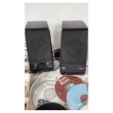 Collection of Cassette Tapes, CDs, and Speakers