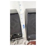 Collection of Cassette Tapes, CDs, and Speakers