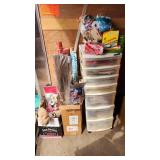 Craft Supplies and Holiday Decorations including Yarn, Wrapping Paper, and Quilting Magazines with rolling drawer plastic cabinet