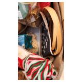 Craft Supplies and Holiday Decorations including Yarn, Wrapping Paper, and Quilting Magazines with rolling drawer plastic cabinet