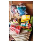 Craft Supplies and Holiday Decorations including Yarn, Wrapping Paper, and Quilting Magazines with rolling drawer plastic cabinet