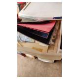 Craft Supplies and Holiday Decorations including Yarn, Wrapping Paper, and Quilting Magazines with rolling drawer plastic cabinet