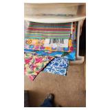 Craft Supplies and Holiday Decorations including Yarn, Wrapping Paper, and Quilting Magazines with rolling drawer plastic cabinet