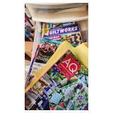 Craft Supplies and Holiday Decorations including Yarn, Wrapping Paper, and Quilting Magazines with rolling drawer plastic cabinet