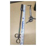 Hi-line Battery Charger, Turnbuckle, Livestock Pill Balling Gun, and Tie-down Ring