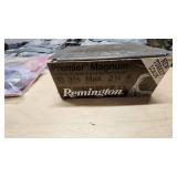 Military Tactical Gear and Ammunition Lot including Remington Premier Magnum 10 Gauge Ammo, Tactical Vest, Hydration Pack, and Accessories