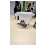 Collection of Vintage Beverage Bottles and Cans Including Miller, Schlitz, 7-Up, and Coca-Cola