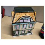 Ceramic Cookie Jars including Nutcracker, House, Apple, and Snowman Scene