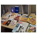 Collection of Books and Magazines including National Geographic and How to Talk Minnesotan