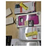 Various Phone Accessories Including OtterBox Defender Case, Mophie Juice Pack, and Samsung S-View Flip Covers