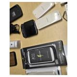 Various Phone Accessories Including OtterBox Defender Case, Mophie Juice Pack, and Samsung S-View Flip Covers