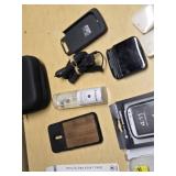 Various Phone Accessories Including OtterBox Defender Case, Mophie Juice Pack, and Samsung S-View Flip Covers